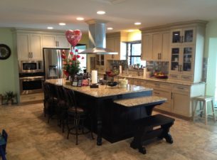 The interior walls in this home were removed to create a "Great Room" area in which the kitchen and the main living space were one in the same.