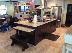 Note the bench seat which was made at the shop. If you look closely you can see that the leg detail is just a variant of the shape of the corbels which support the lowered section of granite.