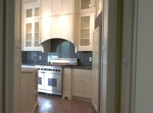 Kitchen design should consider the visual motifs created when walking into them. Here you see that one is treated to the framed image of the cook top elevation as you walk into this Kitchen. Every cabinet is custom designed and built from scratch!