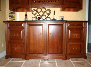 Zoom of the lower portion of this Bar Cabinet Elevation.  Wine cooler behind left door. Sink behind Right door. Venting for the Wine Cooler is done by special sectioning in the furniture base  so as to not interfere with the furniture look