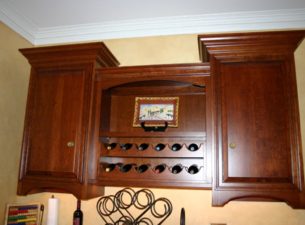 Upper section of the Cherry Bar Elevation.  This was all made from rough Cherry Lumber Stock. The moldings, doors and wine rack were all made in house AT Dixie Workshop