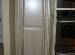 This custom pocket door was made to match the cabinetry in the kitchen. The Casings are a modified form of the kitchen door stile profile.